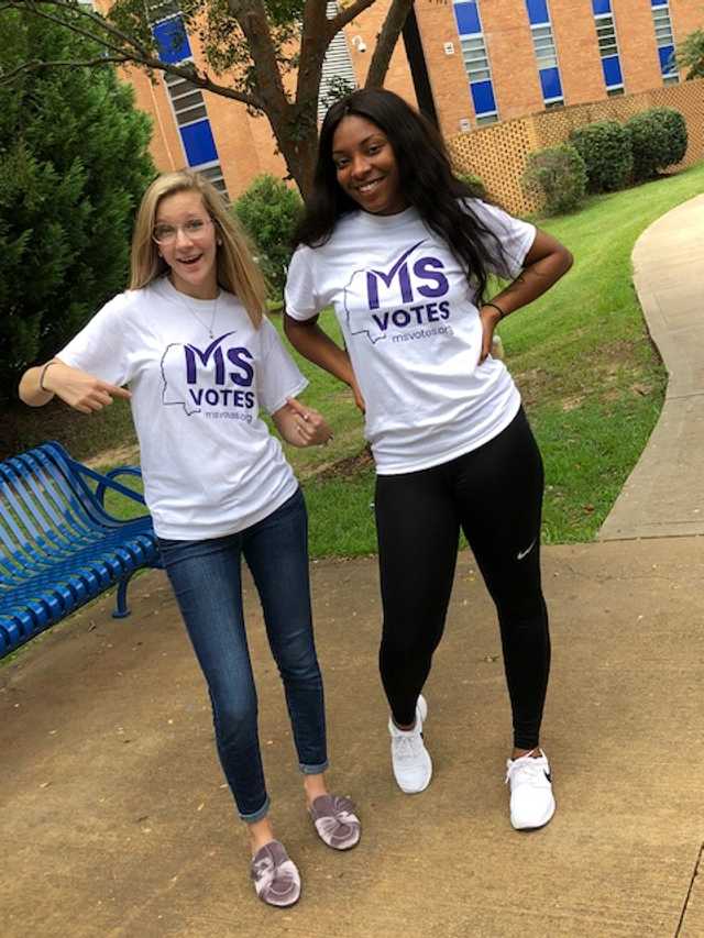 Two people repping MS votes.